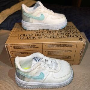 White and blue Nikes